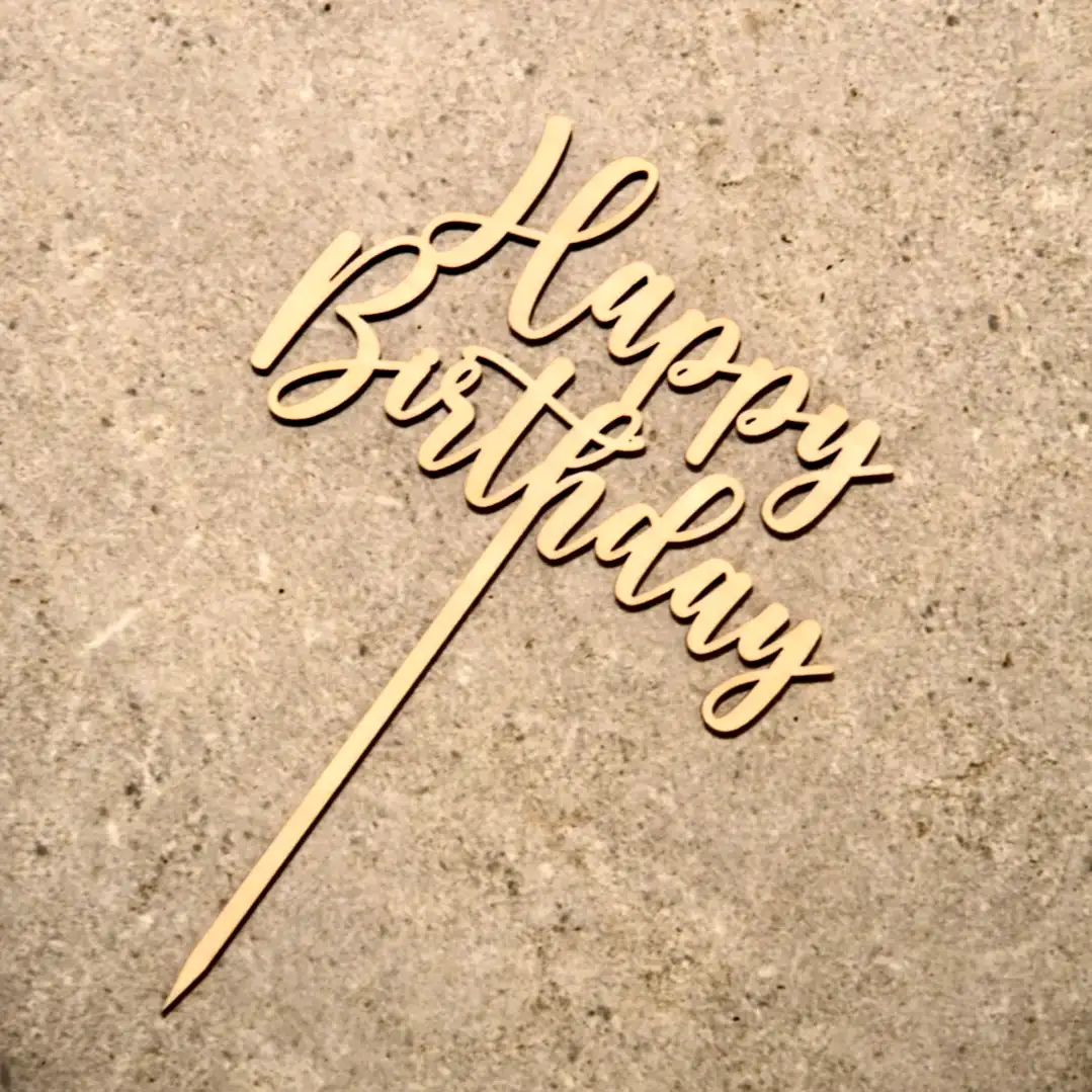 A Happy Birthday cake topper