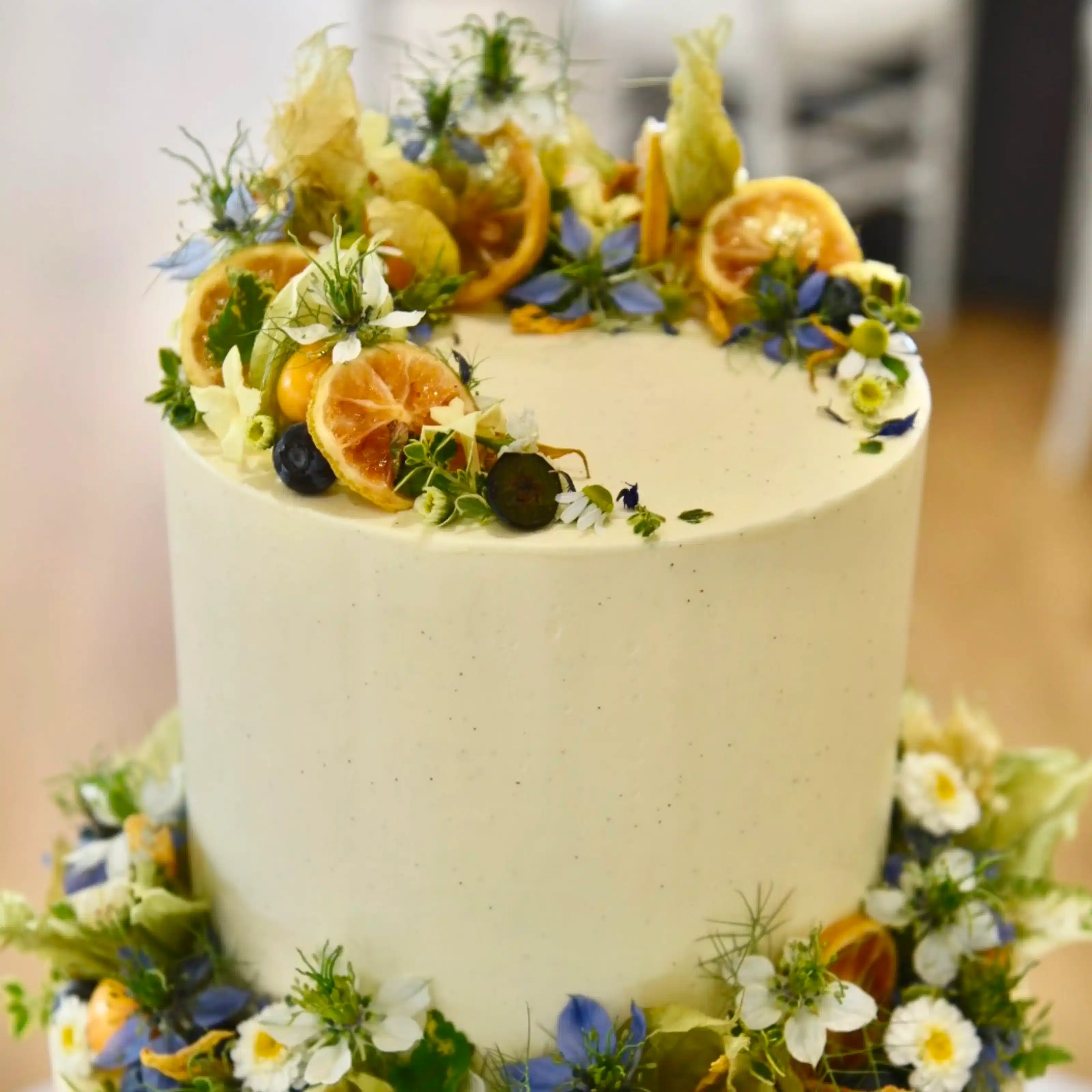 A one tier naturally decorated wedding cake located in The Lensbury Teddington